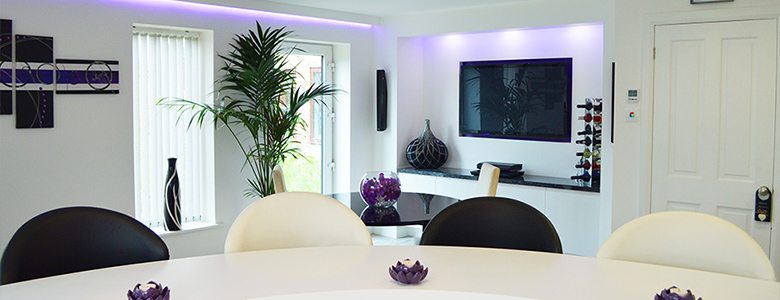 purple coloured lighting used in a kitchen
