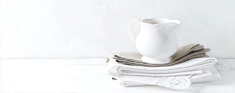 Ceramic jug and tea towels